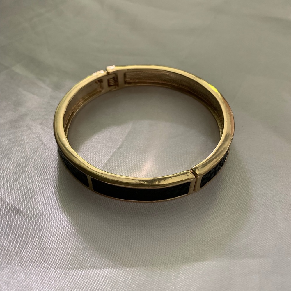 Gold and leather hinge bangle